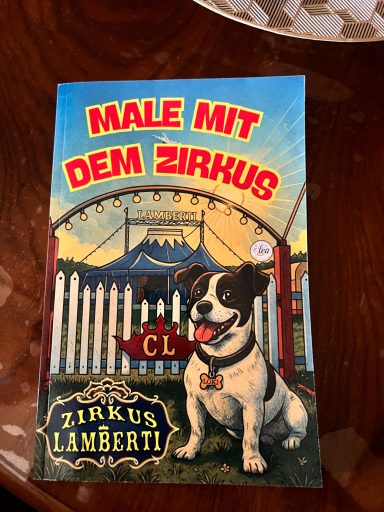 Buchcover mit einem Hund vor einem Zirkuszelt, Titel: "Male mit dem Zirkus".